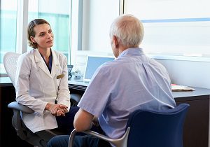 Senior patient with doctor